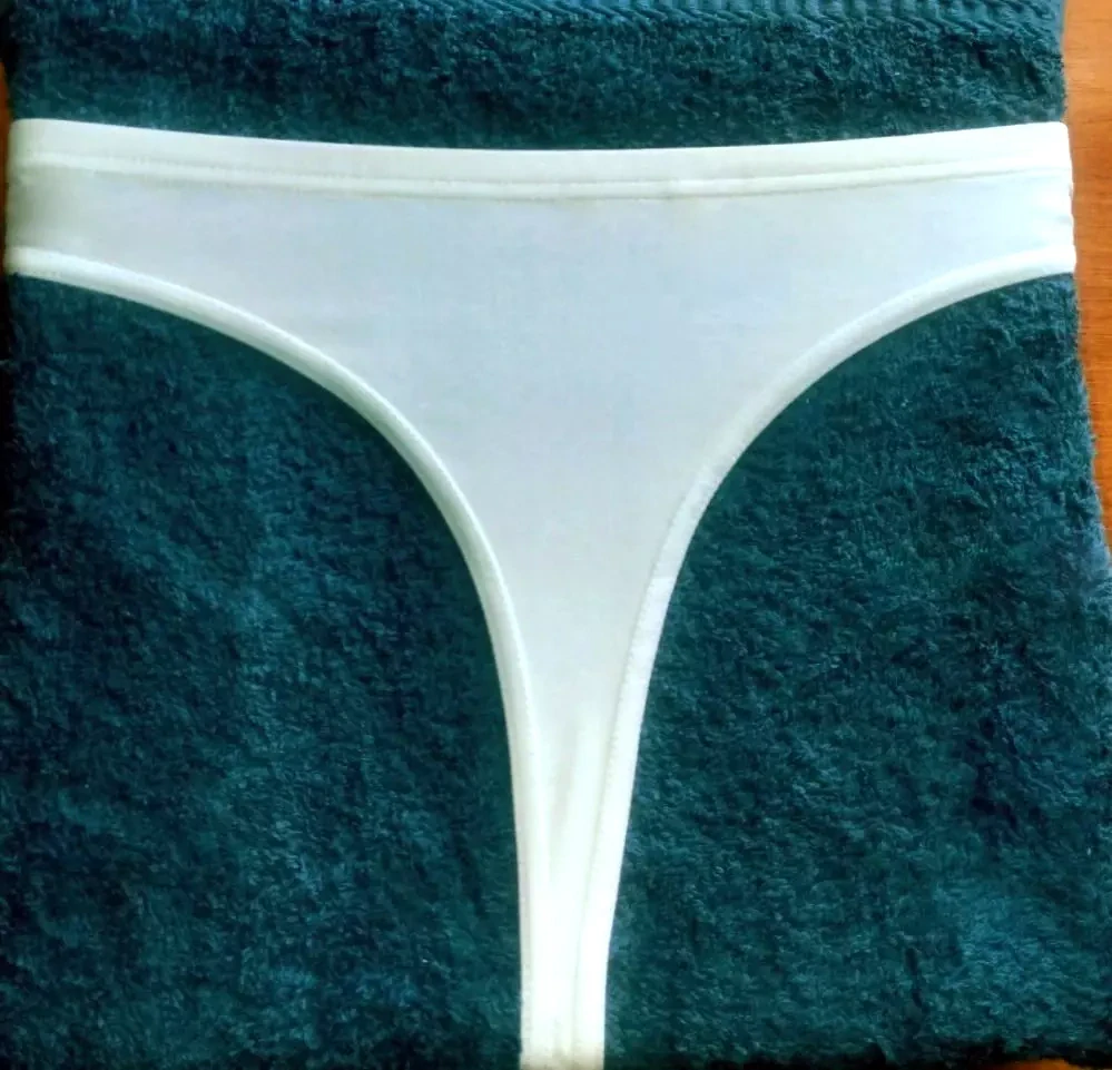 F4H Dámské kalhotky tanga smetanová L