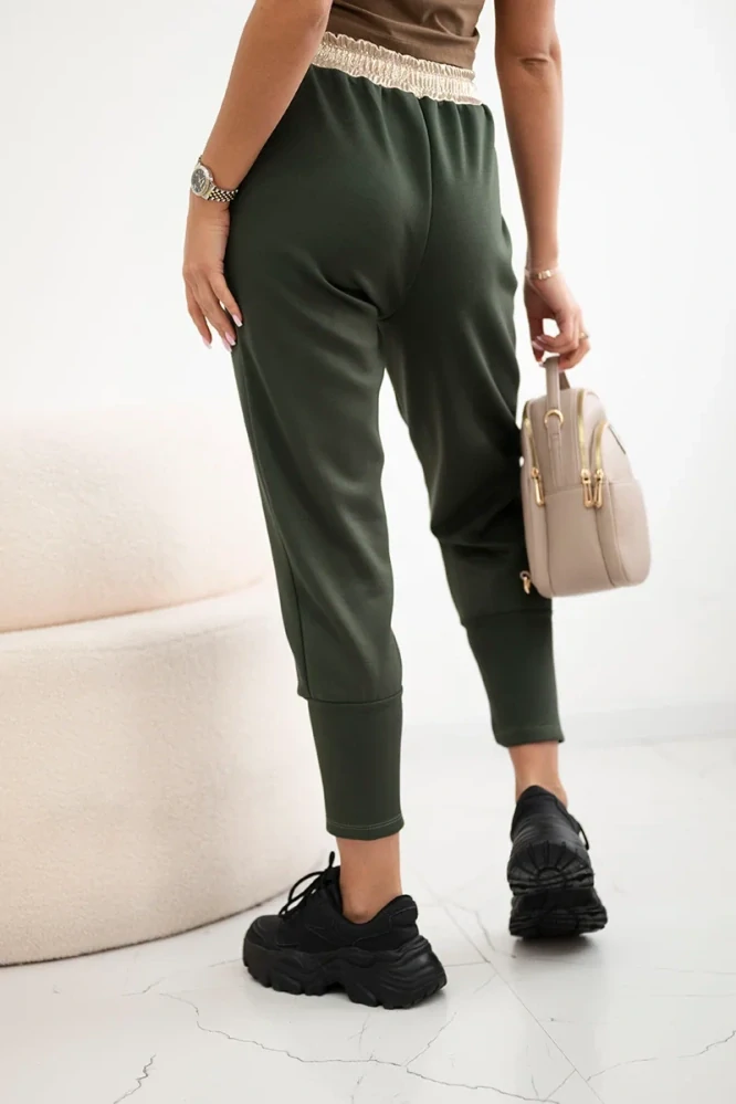 Dámské kalhoty / tepláky BAGGY s kapsami T0076-7 khaki/zelená UNI M/L