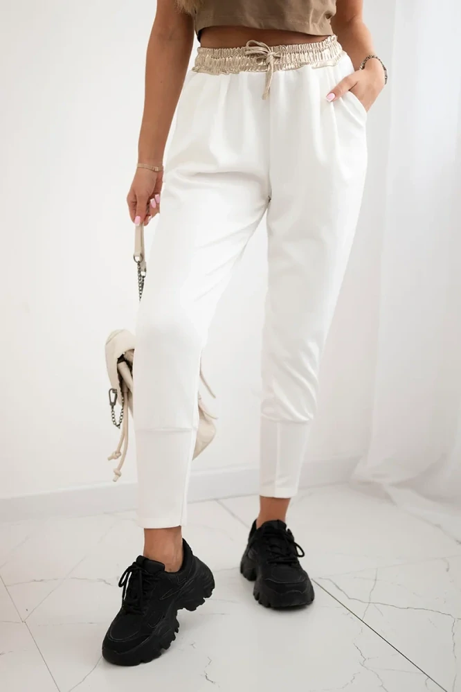 Dámské kalhoty / tepláky BAGGY s kapsami T0076-1 bílá UNI M/L
